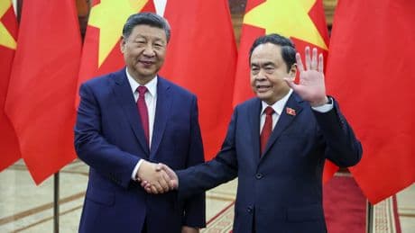 Trump says Xi in Vietnam to ‘screw’ US as China calls for unity against tariff ‘bullying’