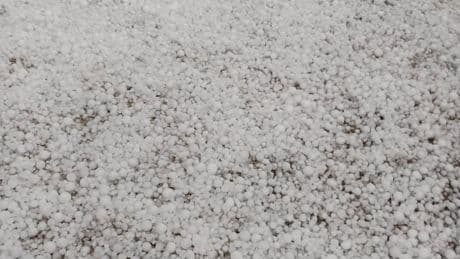 Watch as HAILSTORMS pummel hols hotspot Spain and turn streets white… while Britain bakes in hottest start to May