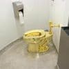 Men who stole $6M golden toilet from English mansion sentenced to prison