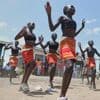 Fusion between culture and modernity as children dance in Kenyan refugee camp