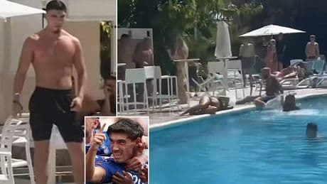 Revealed: Yob who knocked woman out with a chair during wild Ibiza poolside brawl is controversial footballer who scored in Wembley final just three weeks ago