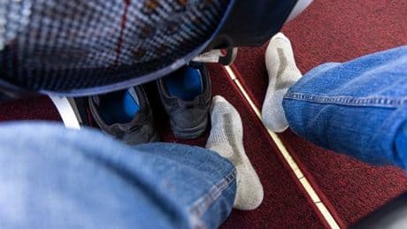 'Selfish passenger ruined my flight with his cheesy feet, so I got the ultimate revenge'