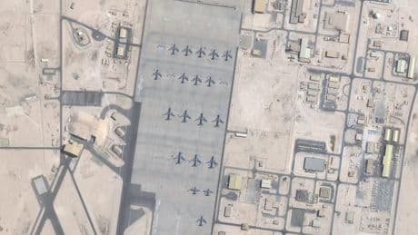 Iran says it fired on a US base. Qatar says air defenses shot down the missiles.