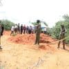 Exhumation in Kenya cult site paused to allow DNA sampling on 34 bodies