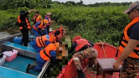 Fisherman, 32, mauled to death by crocodile in front of horrified family after being dragged from riverbank by beast