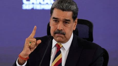 Vessel struck by US military off Venezuela was heading back to shore, AP sources say