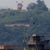 South Korea fires warning shots at North Korean troops crossing border