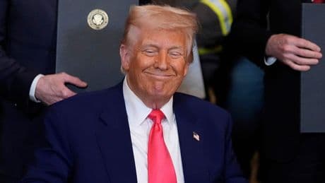 Trump laughs off protester who attempted to disrupt 100 days speech: ‘Thought it was a guy’