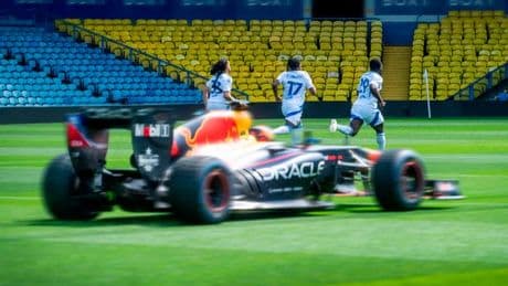 Red Bull star drives F1 car on Premier League pitch in race against footballers