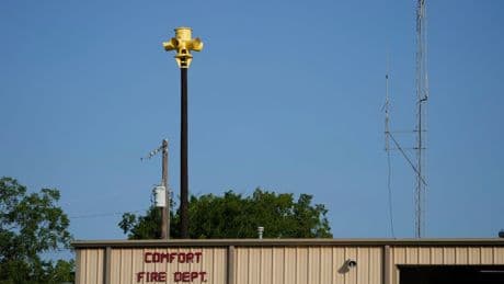 A small Texas community where everyone survived flooding has sirens that warned them