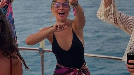 Frankie Bridge shows how to style a sarong as she wows fans with yacht party snaps