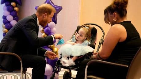 Prince Harry delights children at emotional awards after skipping tense reunion with William