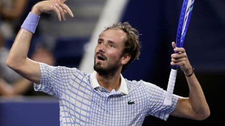 Daniil Medvedev has meltdown after photographer walks on court at US Open match point - before angrily smashing racket on ground