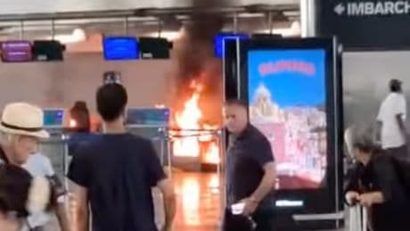 Passengers flee after man sets fire to Milan airport check-in desk