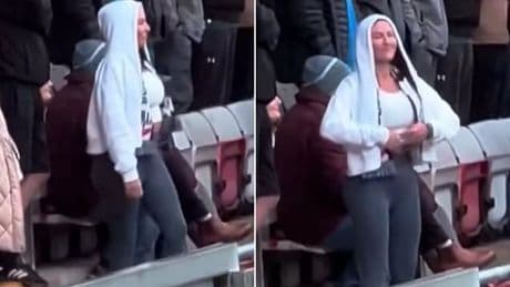 Female football fan has the perfect response to 'slapper' taunt as she flashes rivals supporters