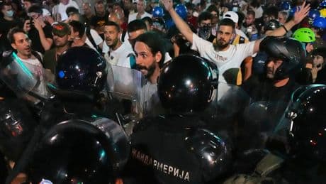 Serbian police remove street blockades in Belgrade and make new arrests as tensions persist