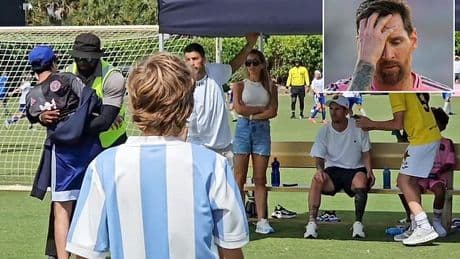 Shocking moment crazed fan runs at Lionel Messi and Luis Suarez before he gets dragged away by security