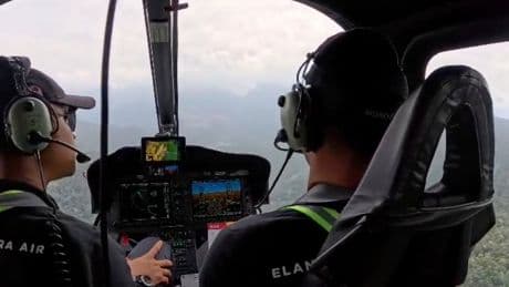 Indonesian rescuers find helicopter crash site on Borneo and recover 1 body so far