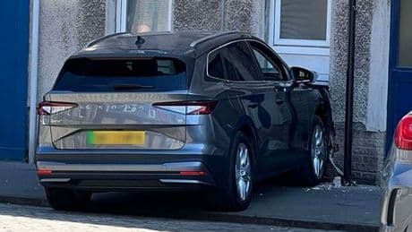 Car ploughs into flats as locals evacuated from homes over gas leak fears