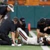 Team physicians in college sports wary of greater liability risk with athletes now making big money