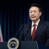 South Korea's central bank cuts borrowing costs to nurse the sluggish economy