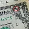 The tiny hidden symbol on every dollar bill... but no one knows what it is