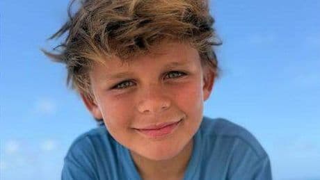 Miracle recovery for boy, 8, mauled by shark after his sister rescued him