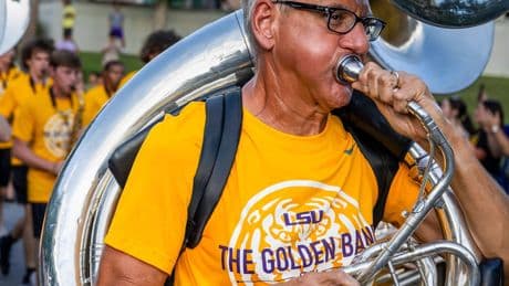 Retired accountant is hitting a high note: He's joined Louisiana State University's marching band