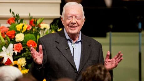 USPS unveils new stamp honoring former President Jimmy Carter
