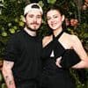 Brooklyn Beckham's friends say they are 'not surprised' he failed to acknowledge David's knighthood - as Victoria and brothers shower father with pride