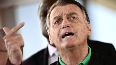 Brazil's Bolsonaro ordered to wear ankle monitor ahead of trial