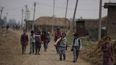 India fires missiles across the frontier with Pakistan, killing at least 1 child, officials say