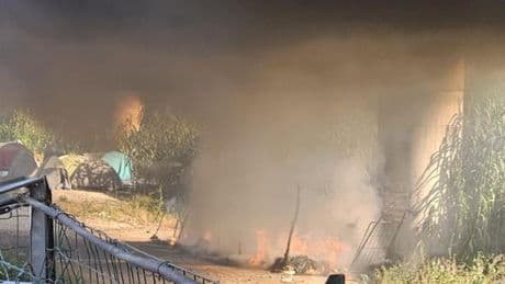 Ventimiglia, rogo nell’accampamento dei migranti | Foto