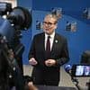 Starmer says Trump is 'absolutely committed to the importance of Nato' after president raises doubts about Article 5 'collective defence' principle at tense summit