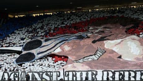 Rangers unfurl huge banner with shotgun pointed at Celtic supporters