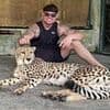 Fury as Ibiza Final Boss poses with 'heavily sedated cheetah' after jetting to Phuket... then deletes post