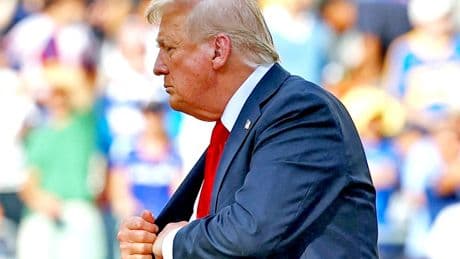 Trump seen pocketing FIFA medal as he walks on stage to hand Chelsea replica club championship trophy