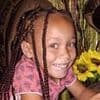 Mother who SOLD her daughter, six, after 'healer' wanted child 'for her light eyes and skin' is jailed for life in South Africa - as girl remains missing