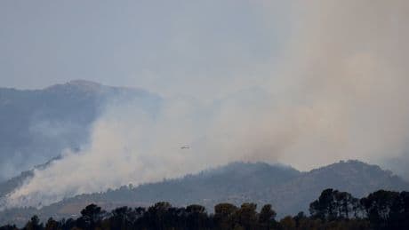 Catalonia wildfire burns 7,000 acres and forces 18,000 people into lockdown