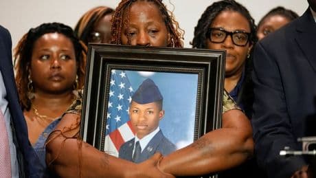 Lawsuit planned over Florida deputy's shooting of US airman who was killed in his own home