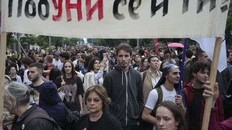 Thousands brave heavy rain to protest Serbia's crackdown on universities