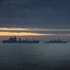 Fears Russia will sink its own ships in a 'false flag' and blame the West after the Kremlin accused Britain of preparing 'mass raids'