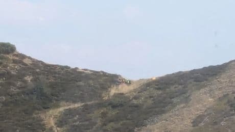 Rescatada una voluntaria en los incendios al desmayarse en el monte Catoute