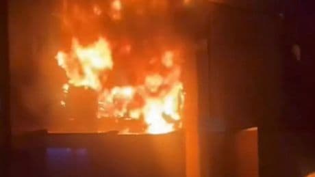 Fatal house fire that killed family seen in horrifying images as man arrested over 'murder'