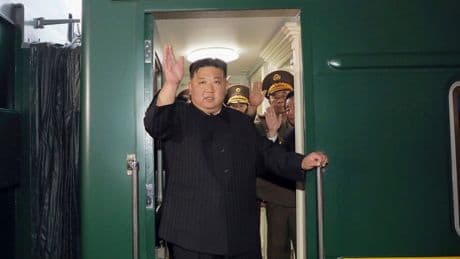 Kim Jong Un rides his trademark green train to China. He also has a plane, limos and white horses