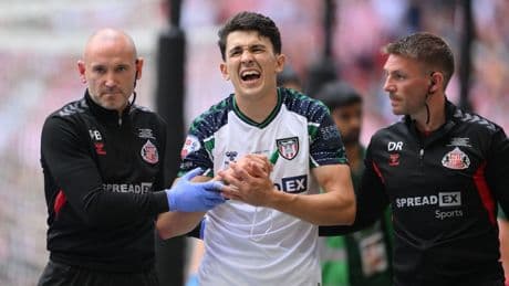 Championship play-off final delayed by sickening injury as Sunderland ace forced off before calling Wag down from stands