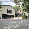 Man at war with council after building a two-storey HOUSE on his driveway without permission