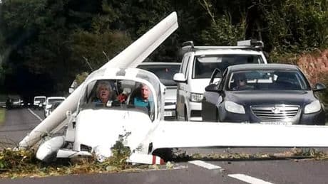 Pilot 'switched hands on controls' before crashing light aircraft on busy A road