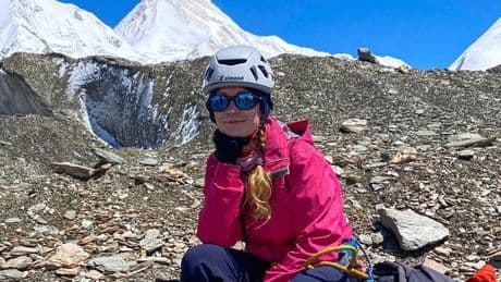 Son of climber stuck 22,000ft up Victory Peak with broken leg claims mum 'alive'