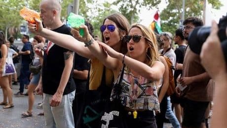 Brits warned as Spanish protestors 'armed with water-pistols' set new date for chaos